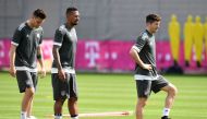 (L-R) Bayern Munich's defenders Niklas Suele, Jerome Boateng and Polish striker Robert Lewandowski attend a training session at the trainings ground of FC Bayern Munich in Munich, southern Germany, on April 24, 2018 on the eve of the UEFA Champions League
