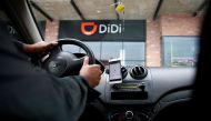 A new driver's mobile phone is seen with the app of Chinese ride-hailing firm, outside the new drivers center in Toluca, Mexico, April 23, 2018. REUTERS/Carlos Jasso