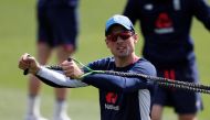 FILE PHOTO: England's Alastair Cook warms up before nets. REUTERS/Paul Childs
