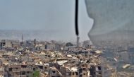 A picture taken during a government guided tour near Damascus' southern al-Qadam neighbourhood shows destruction in Yarmuk, a Palestinian refugee camp on the edge of the capital, as the regime continue their offensive to oust the Islamic State (IS) group 