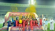 Al Duhail players and officials celebrate their win over Al Sadd in the Qatar Cup final at Al Sadd Stadium in Doha yesterday. Pic:Baher Amin/The Peninsula