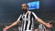 Juventus' Gonzalo Higuain celebrates scoring their third goal REUTERS/Alberto Lingria
