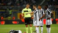 Juventus' Mario Mandzukic lies injured REUTERS/Stefano Rellandini
