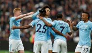 Manchester City's Fernandinho celebrates scoring their fourth goal with teammates. Reuters/John Sibley 
