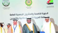 Abdulaziz bin Hamad Al Ageel (left), Secretary-General of GOIC; and Adel Sakr Abdulkareem Al Sakr (right), Director-General of AIDMO, after signing the MoU in Kuwait.