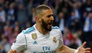 Real Madrid's Karim Benzema celebrates scoring their first goal. Reuters/Kai Pfaffenbach