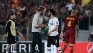 Liverpool's German manager Jurgen Klopp celebrates with Liverpool's Egyptian midfielder Mohamed Salah at the end of the UEFA Champions League semi-final second leg football match between AS Roma and Liverpool at the Olympic Stadium in Rome on May 2, 2018.
