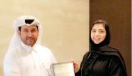 The officials with ‘The Mortgage Product of the Year – QNB First Cross Border Service’ award.