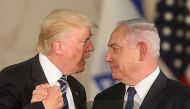 FILE PHOTO: US President Donald Trump and Israel Prime Minister Benjamin Netanyahu shaking hands after delivering a speech at the Israel Museum in Jerusalem on May 23, 2017. (AFP / Gil Cohen-Magen) 