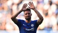 Chelsea's French striker Olivier Giroud gestures at the final whistle during the English Premier League football match between Chelsea and Liverpool at Stamford Bridge in London on May 6, 2018.  AFP / Glyn Kirk