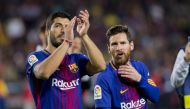 Barcelona Lionel Messi and Luis Suarez celebrate at the end of the Spanish league football match between FC Barcelona and Real Madrid CF at the Camp Nou stadium in Barcelona on May 6, 2018. ( LOLA BOU - Anadolu Agency )
