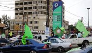 Supporters of the Marada political party parade in their cars in the northern city of Zgharta as they celebrate the parliamentary elections results on May 7, 2018. / AFP / IBRAHIM CHALHOUB