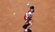 Serbia's Novak Djokovic in action during his first round match against Japan's Kei Nishikori Reuters/Susana Vera