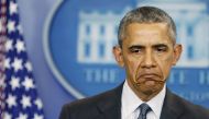 FILE PHOTO: Barack Obama reacts to a question while delivering remarks on the economy in the White House press briefing room in Washington, April 5, 2016. Reuters/Gary Cameron