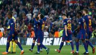 :Barcelona's Argentinian forward Lionel Messi (C) celebrates with teammates after scoring a goal during the Spanish league football match between Barcelona and Villarreal at the Camp Nou Stadium in Barcelona on May 9, 2018. / AFP / Pau Barrena