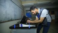 Iraqi polling station staff is seen after polls closed for the Iraqi parliamentary election in Baghdad, Iraq on May 12, 2018. Murtadha Sudani - Anadolu
