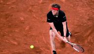 Germany's Alexander Zverev returns the ball to Canada's Denis Shapovalov during their ATP Madrid Open semi-final tennis match at the Caja Magica in Madrid on May 12, 2018. AFP / Javier Soriano