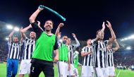 Juventus' goalkeeper from Italy Gianluigi Buffon celebrates with teammates at the end of the Italian Serie A football match AS Roma vs Juventus at the Olympic stadium on May 13, 2018 in Rome.  AFP / Tiziana Fabi