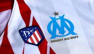 An illustration shows jerseys of Atletico Madrid and Marseille in Madrid on May 15, 2018. Atletico Madrid and Marseille prepare to meet in the Europa League final in Lyon on May 16, 2018. / AFP / Benjamin CREMEL