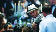 British Formula One driver Lewis Hamilton attends an auction on May 17, 2018 during the amfAR 25th Annual Cinema Against AIDS gala at the Hotel du Cap-Eden-Roc in Cap d'Antibes, southern France, during the 71th Cannes Film Festival. AFP / Alberto Pizzoli
