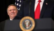 US President Donald Trump is watched by Secretary of State Mike Pompeo as they take part in the swearing-in ceremony for the Central Intelligence Agency's first female director, Gina Haspel, at CIA Headquarters in Langley, Virginia, May 21, 2018. Reuters/