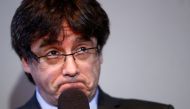 FILE PHOTO: Catalonia's former leader Carles Puigdemont reacts during a news conference in Berlin, Germany, April 7, 2018. REUTERS/Hannibal Hanschke/File Photo