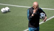 Real Madrid's French coach Zinedine Zidane attends a training session during Real Madrid's Media Open Day ahead of their UEFA Champions league final footbal match against Liverpool FC, in Madrid on May 22, 2018. / AFP / GABRIEL BOUYS