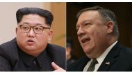 North Korean leader Kim Jong Un and US Secretary of State Mike Pompeo (KCNA via KNS & AFP/Getty Images North America/ Mark Wilson) 