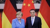 China's Premier Li Keqiang (R) shakes hands with German Chancellor Angela Merkel after a joint news conference at the Great Hall of the People in Beijing, China, May 24, 2018. REUTERS/Jason Lee