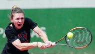 Romania's Simona Halep returns the ball during a training session in Paris on May 24, 2018, ahead of The Roland Garros 2018 French Open tennis tournament. AFP / Thomas Samson