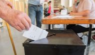 A voter casts her vote at the Marlborough Street National School polling station in Dublin, Ireland on May 25, 2018, during the Irish referendum on liberalising the abortion law. / AFP / BARRY CRONIN 