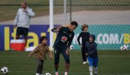 Brazil's player Neymar (C) plays with his son David Lucca (R) and other children after a training session of the national football team ahead of the FIFA 2018 World Cup, at Granja Comary training centre in Teresopolis, Rio de Janeiro, Brazil, on May 25, 2