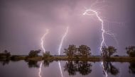 A picture taken on May 27, 2018 shows thunderbolts in the night sky in Premnitz, northwestern Germany. - Germany OUT / AFP / dpa / Julian St