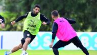 Uruguay's Luis Suarez (L) takes part in a training session at the Complejo Celeste sports complex near Montevideo, in Canelones Department, on May 28, 2018 ahead of the FIFA World Cup. AFP / Miguel Rojo