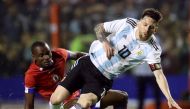 Argentina's Lionel Messi in action with Haiti's Waldo Vernet (REUTERS/Marcos Brindicci)