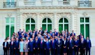 Organisation for Economic Co-operation and Development (OECD) Secretary-General Angel Gurria, French President Emmanuel Macron, Lithuania's President Dalia Grybauskaite and Colombia's President Juan Manuel Santos pose for a family photo with heads of dele