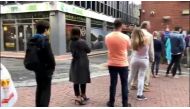 People queue at an ATM in Dublin, Ireland, in this still image obtained from social media video June 1, 2018. TWITTER / @CJSTARRY/via REUTERS 