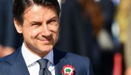 Italy’s Prime Minister Giuseppe Conte looks on as he takes part in the ceremony to mark the anniversary of the Italian Republic (Republic Day) on June 2, 2018 at Piazza Venezia in Rome. / AFP / Vincenzo PINTO