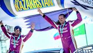 Qatar’s Adel Abdulla (right) and Nasser Al Kuwari celebrate their third place finish.