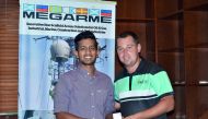 Pratyush Jain (left) with Doha Golf Club’s Golf Operations Manager, Jordan Massey.
