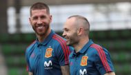 Spain's Andres Iniesta and Sergio Ramos talk as they prepare to meet Spain's new Prime Minister Pedro Sanchez at the Spanish Federation Soccer Headquarters in Las Rozas, Spain, June 5, 2018.REUTERS/Susana Vera