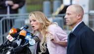 Stephanie Clifford, also known as Stormy Daniels, speaks outside US Federal Court with her lawyer Michael Avenatti in Lower Manhattan on April 16, 2018. (AFP / Eduardo Munoz Alvarez)
