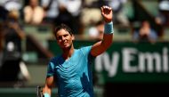 Spain's Rafael Nadal celebrates after victory over Argentina's Diego Schwartzman at the end of their men's singles quarter-final match on day twelve of The Roland Garros 2018 French Open tennis tournament in Paris on June 7, 2018. (AFP / CHRISTOPHE SIMON)