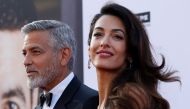 Actor George Clooney and his wife Amal pose at the 46th AFI Life Achievement Award Gala in Los Angeles, California, U.S., June 7, 2018. REUTERS/Mario Anzuoni