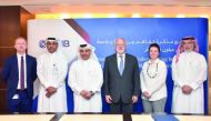 Ali Al Kuwari (third left), QNB Group CEO; Michael Trick (third right), Dean of CMU-Q, and other senior officials after signing the MoU for cooperation between QNB and Carnegie Mellon University in Qatar (CMU-Q).