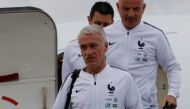 Coach Didier Deschamps and his team staff disembark from a plane. REUTERS/Tatyana Makeyeva
