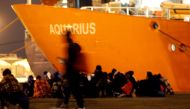 Migrants disembark from the MV Aquarius, a search and rescue ship run in partnership between SOS Mediterranee and Medecins Sans Frontieres, after it arrived in Augusta on the island of Sicily, Italy, January 30, 2018. Reuters/Antonio Parrinello