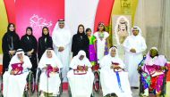 The elderly residents of the Empowerment and Elderly Care Centre with the staff of Commercial Bank during the Iftar. 