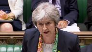 A video grab from footage broadcast by the UK Parliament's Parliamentary Recording Unit (PRU) shows Britain's Prime Minister Theresa May as she answers questions on the G7 summit, in the House of Commons in London on June 11, 2018. AFP PHOTO / PRU