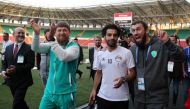 Egyptian national team football player and Liverpool's star striker Mohamed Salah (2ndR) and head of the Chechen Republic Ramzan Kadyrov (2ndL) pose during a training of Egyptian team at the Akhmat Arena stadium in Grozny on June 10, 2018, ahead of the Ru